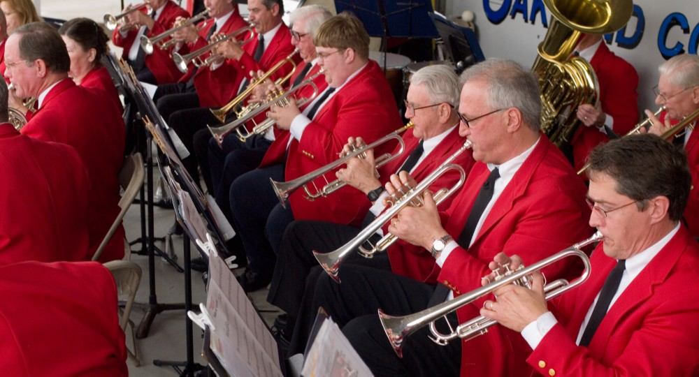Birmingham Concert Band performing in red jackets
